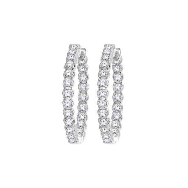 A pair of 10k white gold hoop earrings encrusted with diamonds.